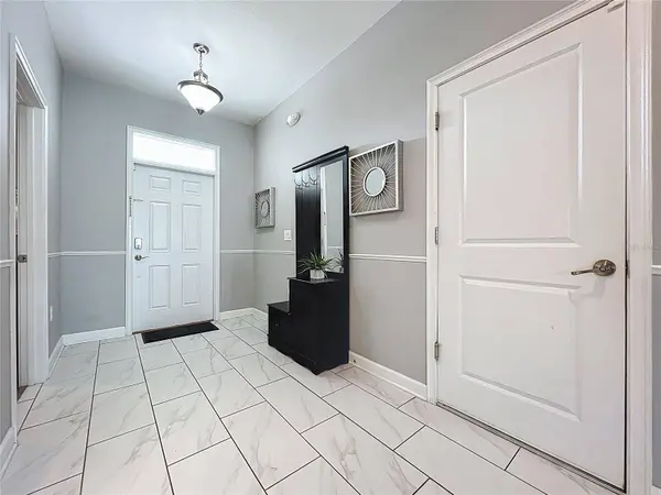 9048 SAND TRAP DR, Davenport, FL 33896