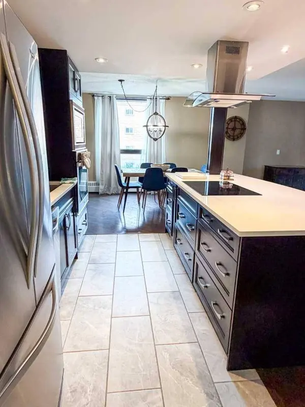 1304 15 AVE SW #220, Calgary, AB T3C 0X7