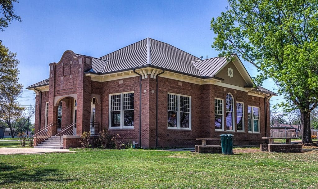 Historic Downtown Kyle street view with rail line visible.
