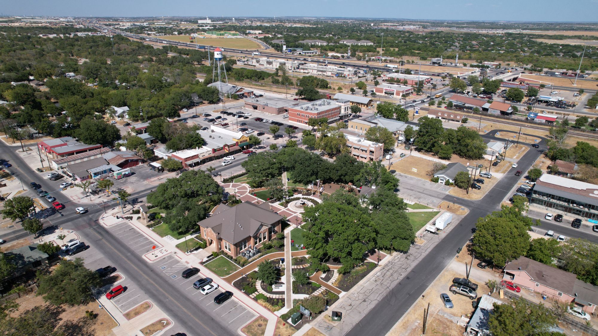 New streetscape and sidewalk in Kyle downtown revitalization area.