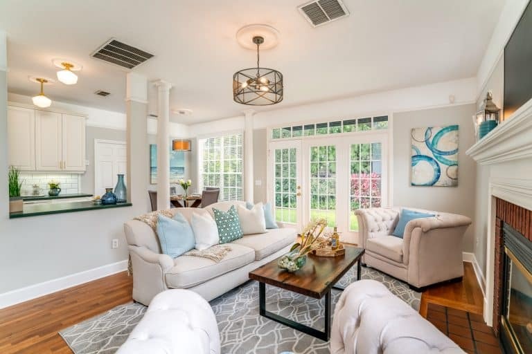 Bright neutral living room staged for sale