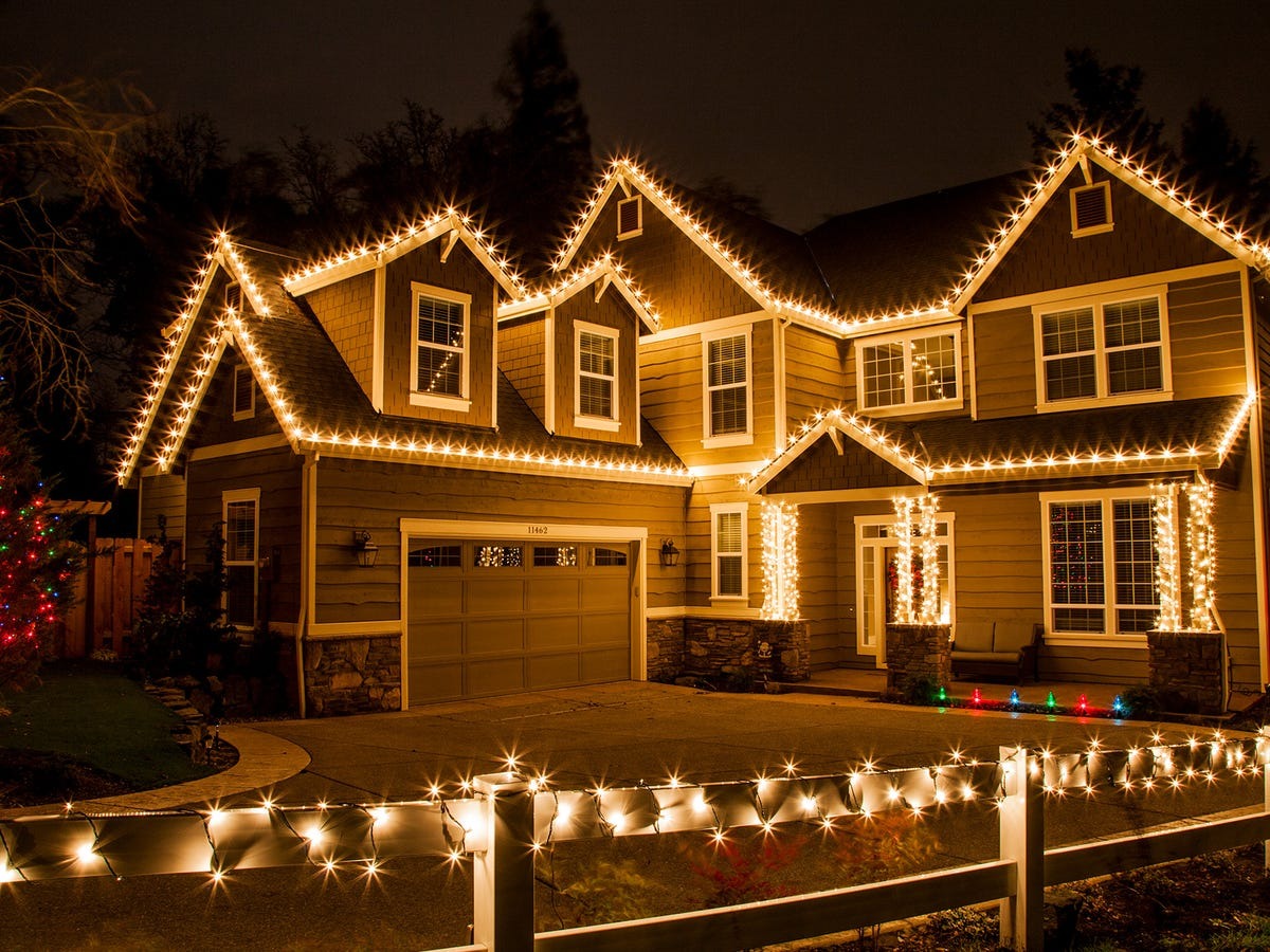 Winter home exterior with holiday lights in an Austin suburb