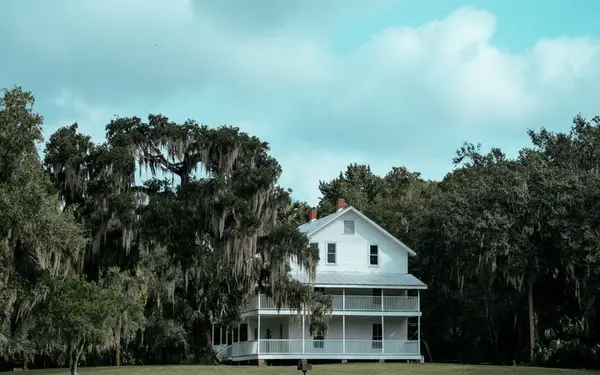 White Lowcountry home under moss-draped live oaks near Mount Pleasant, South Carolina
