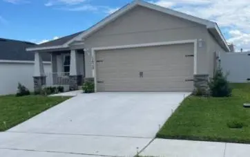 1128 Mountain Flower Ln, Davenport, FL 33837-4227