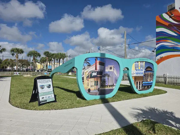 Giant Sunglasses Art Installation in Lake Worth Beach: A Fun Cultural Photo Spot,Twins Selling The Palm Beaches