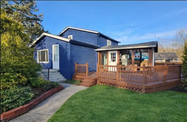 Updated Brunswick Bungalow With Sunroom, Fenced Yard, and Flexible Living Space