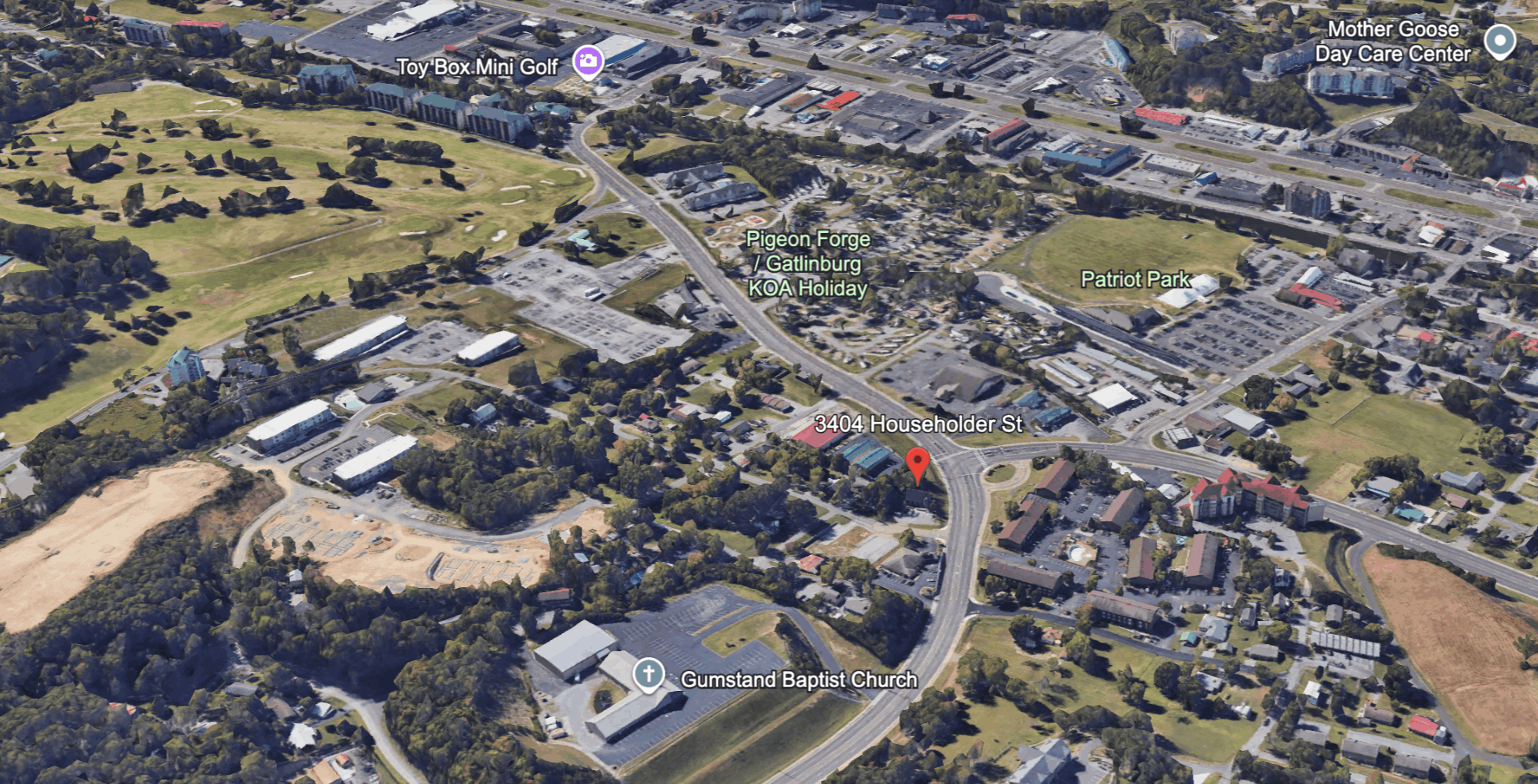 Aerial view of Pigeon Forge showing 3404 Householder Street and the surrounding commercial area