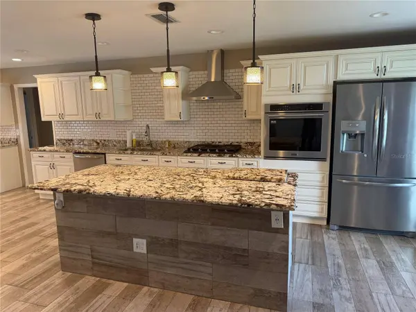 1410 SAXON BLVD, Deltona, FL 32725