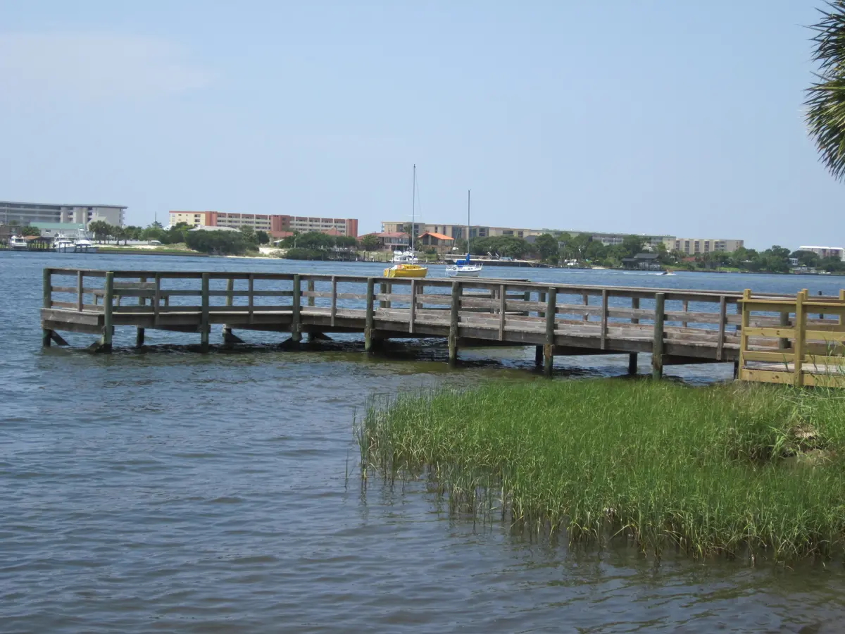 Fort Walton Landing waterfront and dock overlooking the water in Fort Walton Beach, Florida.