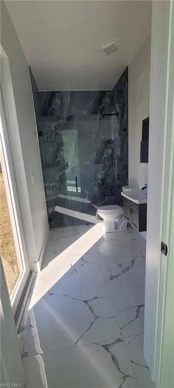 402 Harrison DR, Lehigh Acres, FL 33936