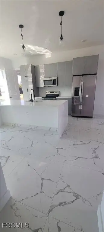 402 Harrison DR, Lehigh Acres, FL 33936