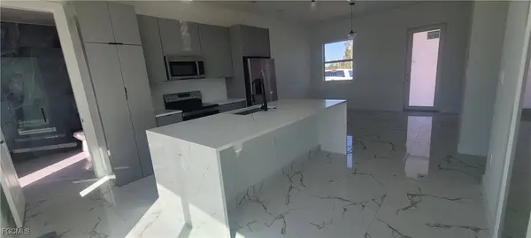 402 Harrison DR, Lehigh Acres, FL 33936