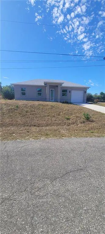 402 Harrison DR, Lehigh Acres, FL 33936
