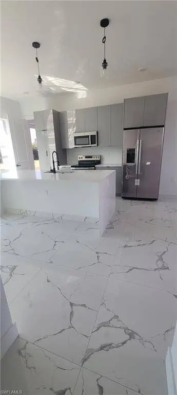 402 Harrison DR, Lehigh Acres, FL 33936