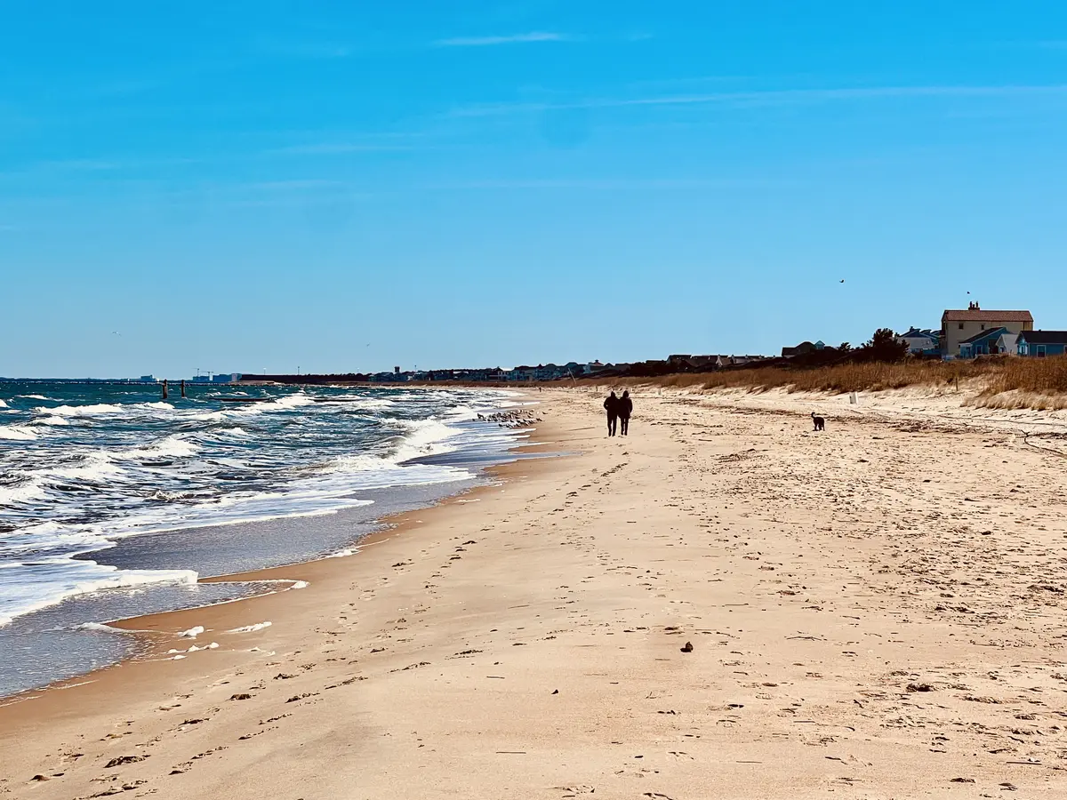 Couple walking on Virginia Beach