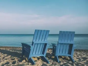 Beach with two chairs