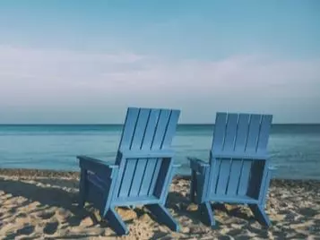 Beach with two chairs