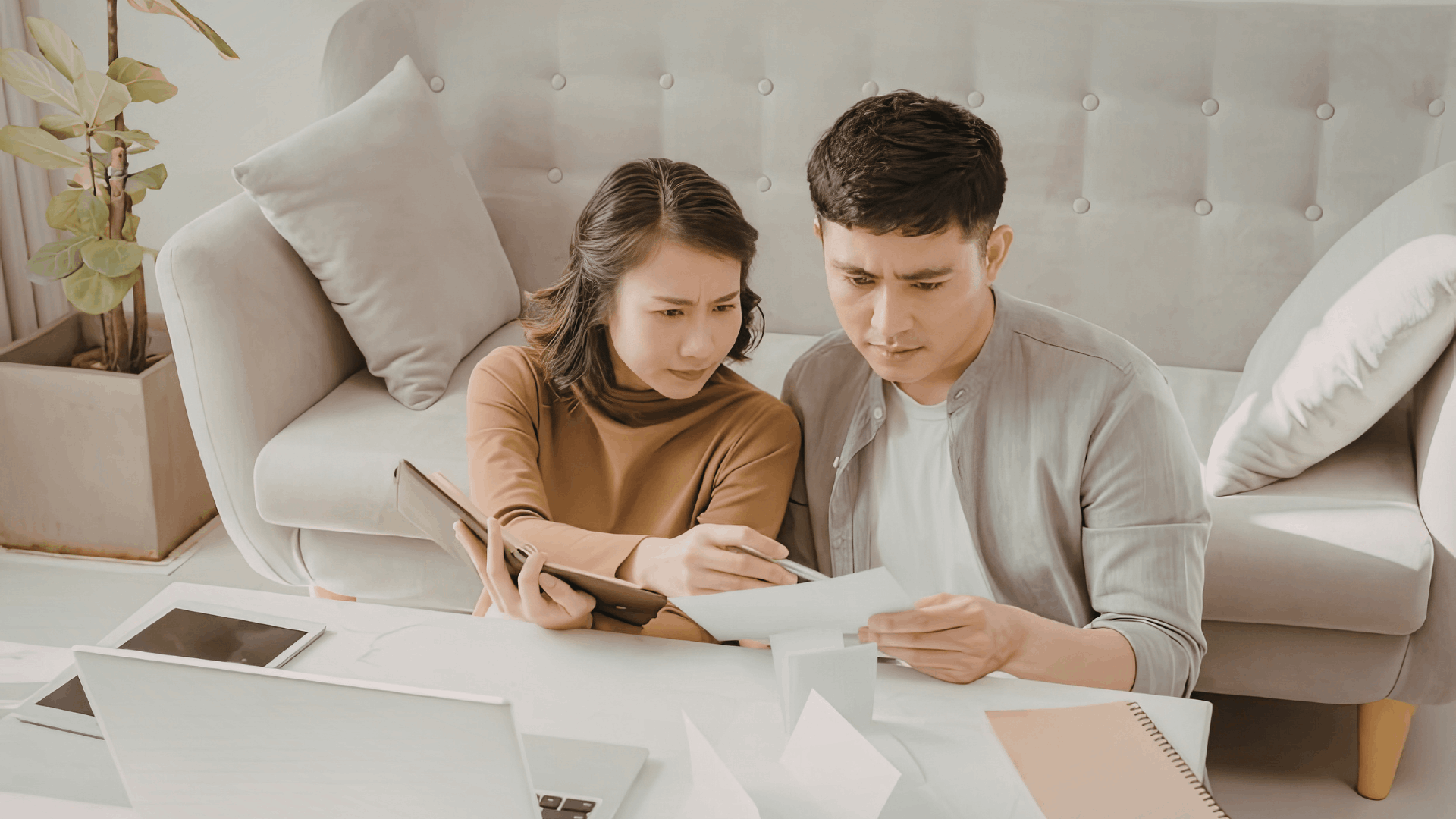 couple reviewing papers
