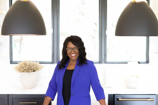 Therese Johnson standing at a kitchen island