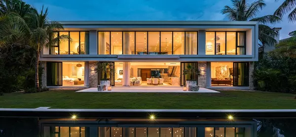 Miami-Shores-home-ext-backyard-pool-on-intracoastal-at-night