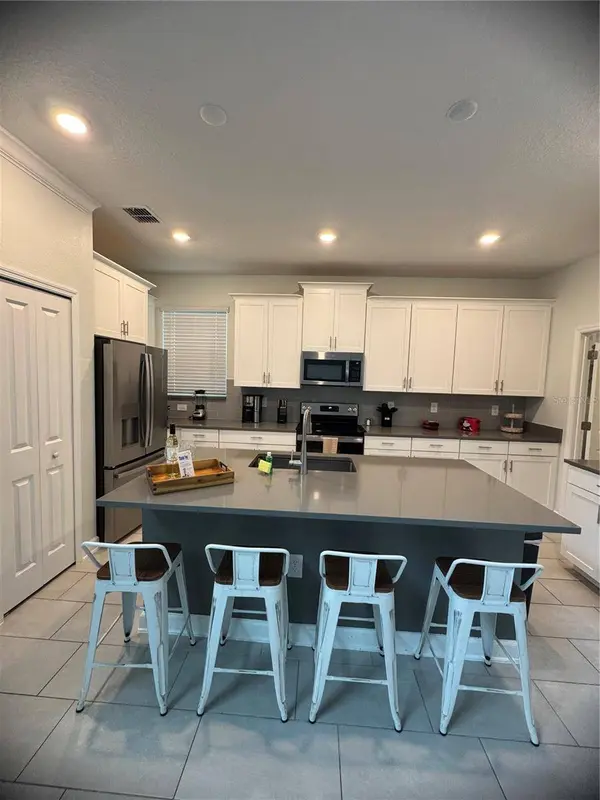 8973 PLAY THROUGH DR, Davenport, FL 33896
