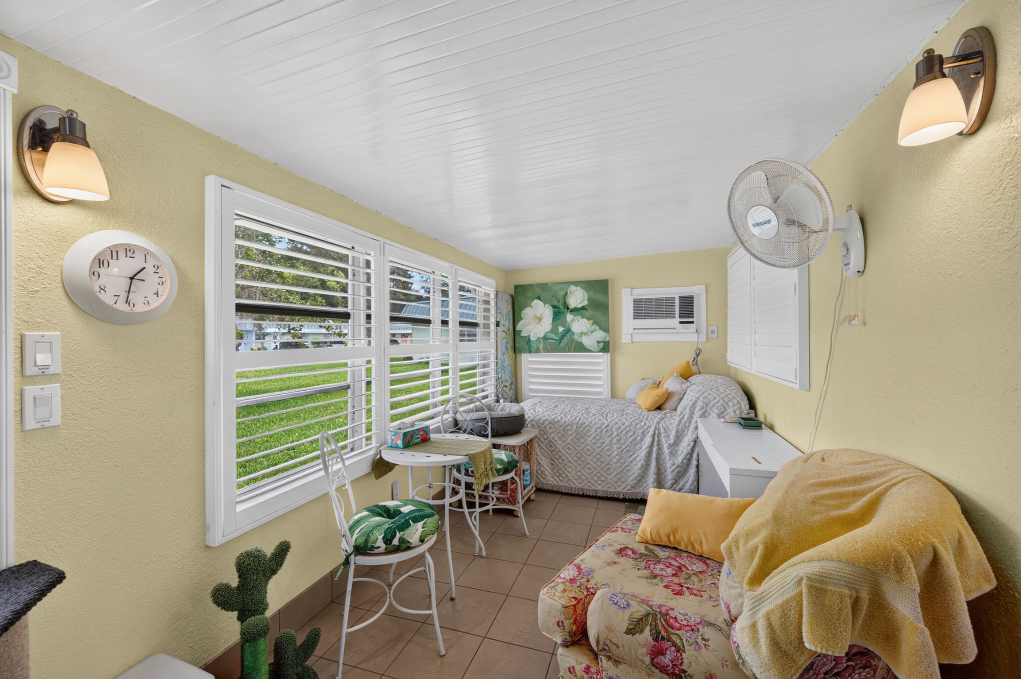 Spacious Florida room in SummerTree 55+ condo for sale in New Port Richey, Florida