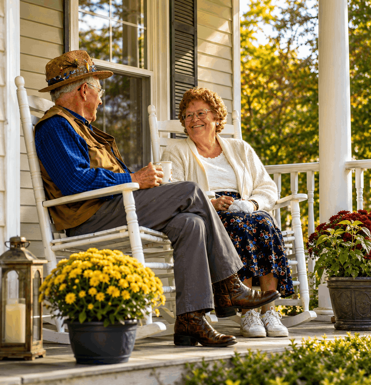 Older couple enjoying talking on a front porch 