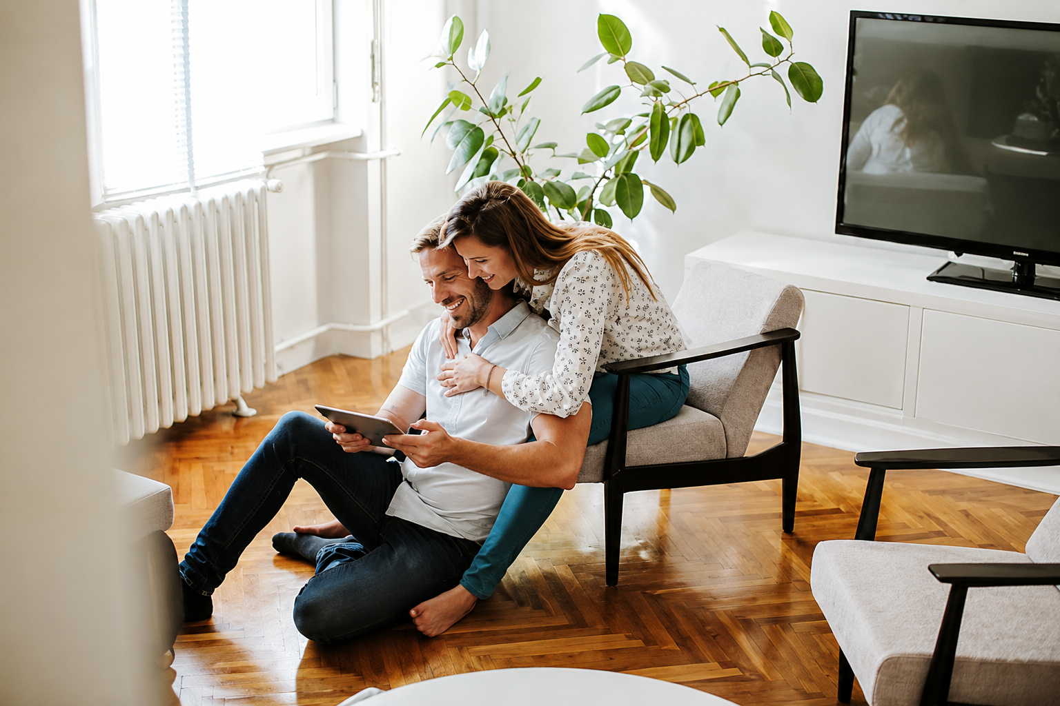 Couple looking at homes on the computer