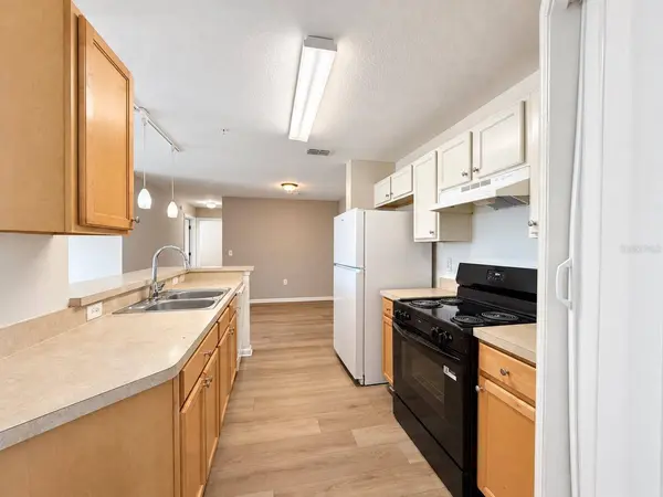 5848 LAKE POINTE VILLAGE CIR #411, Orlando, FL 32822