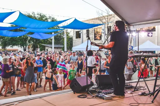 feature image of Round Rock in May: House-Hunting Around Music on Main