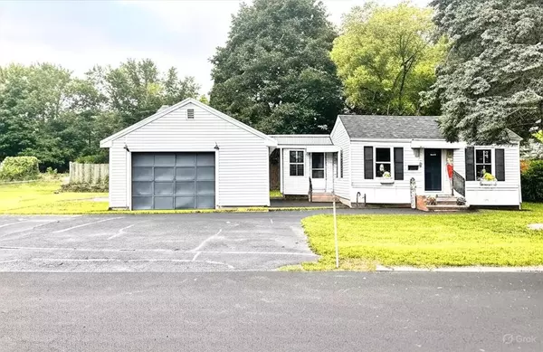 bright white kitchen with stainless steel