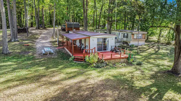 4499 Woodland Drive, Six Lakes, MI 48886