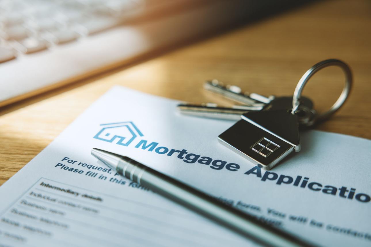 Mortgage documents illustrating how a VA loan assumption works.