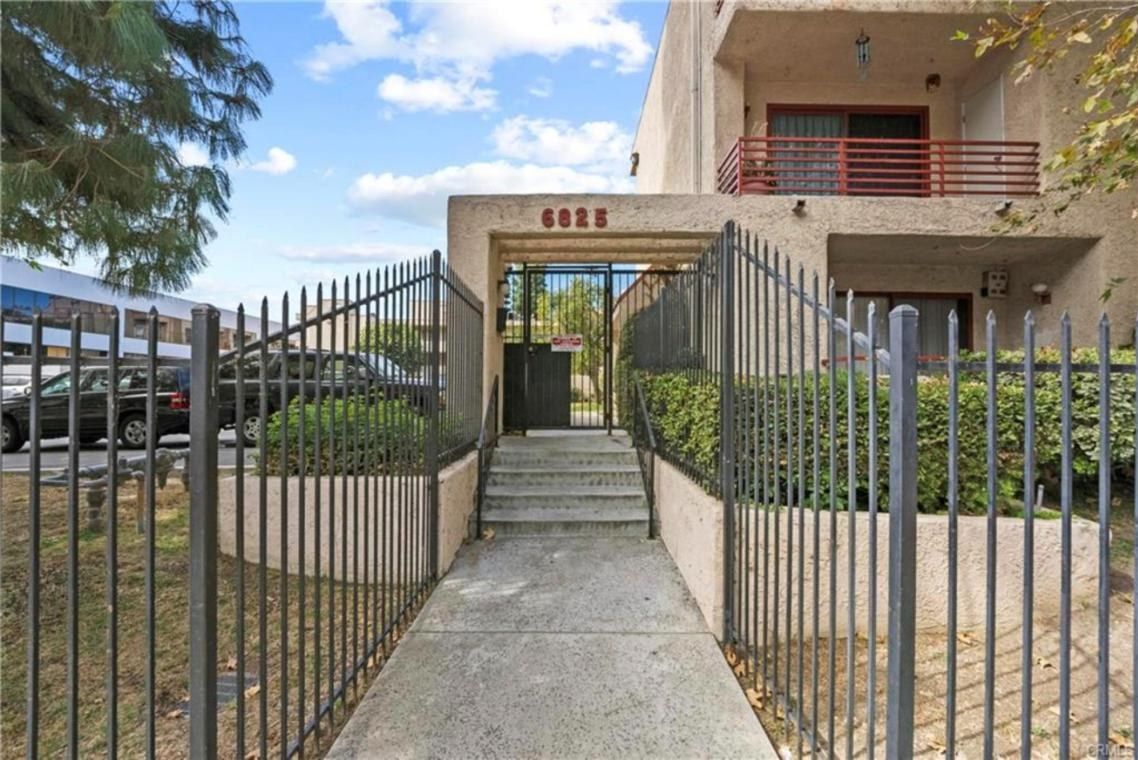 Gated pedestrian entrance to Warner Gardens condos at 6825 Alabama Avenue, Canoga Park
