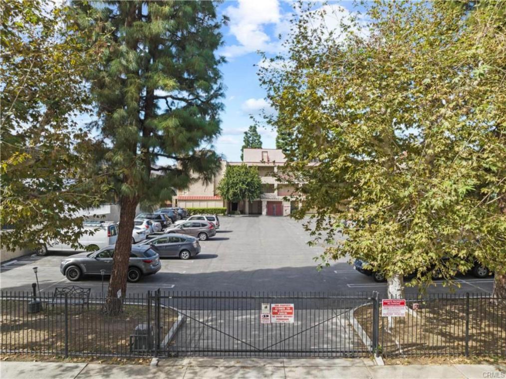 Gated parking lot at Warner Gardens condos in Canoga Park