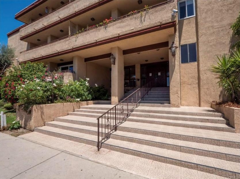 Front entrance and stairs of the 5412 Lindley Avenue condominium building in Encino