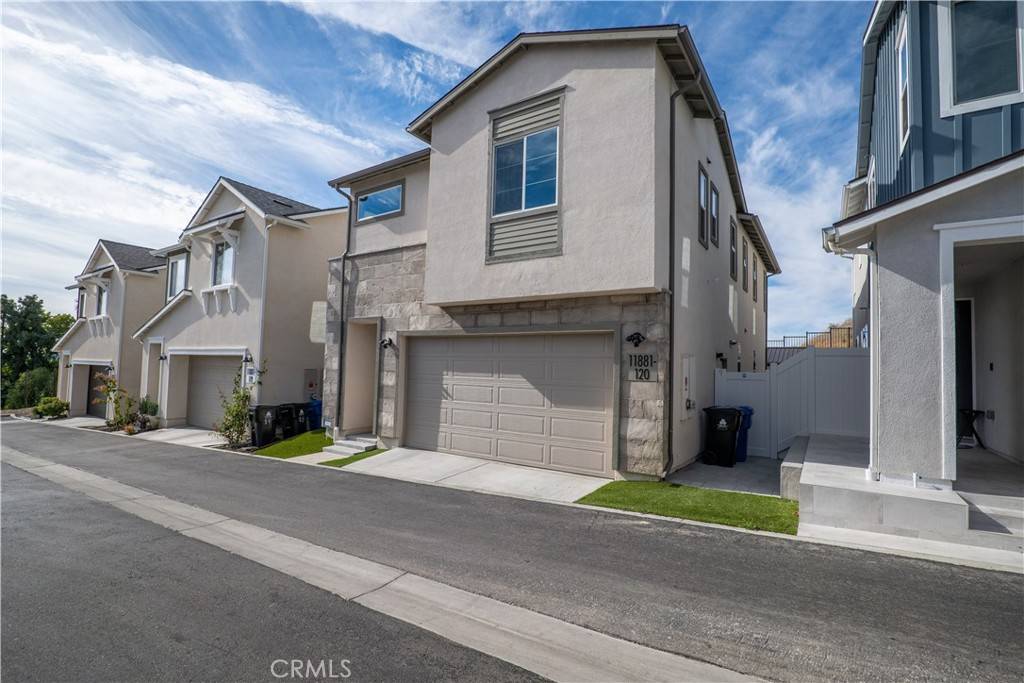 Two-story detached homes with attached two-car garages along the private drive at Angeles Pointe, 11881 Terra Vista Way, Lake View Terrace