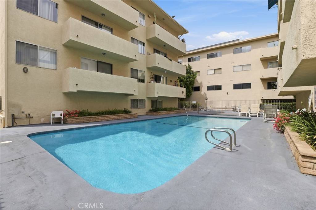 Pool in the courtyard of the Ports of Call condos at 5400 Lindley Ave, Encino