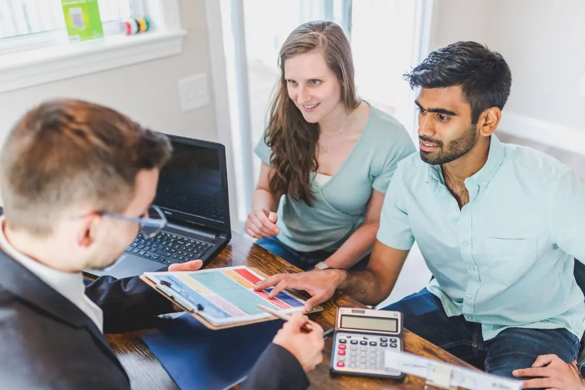 Home buyer discussing financing options with a mortgage professional.
