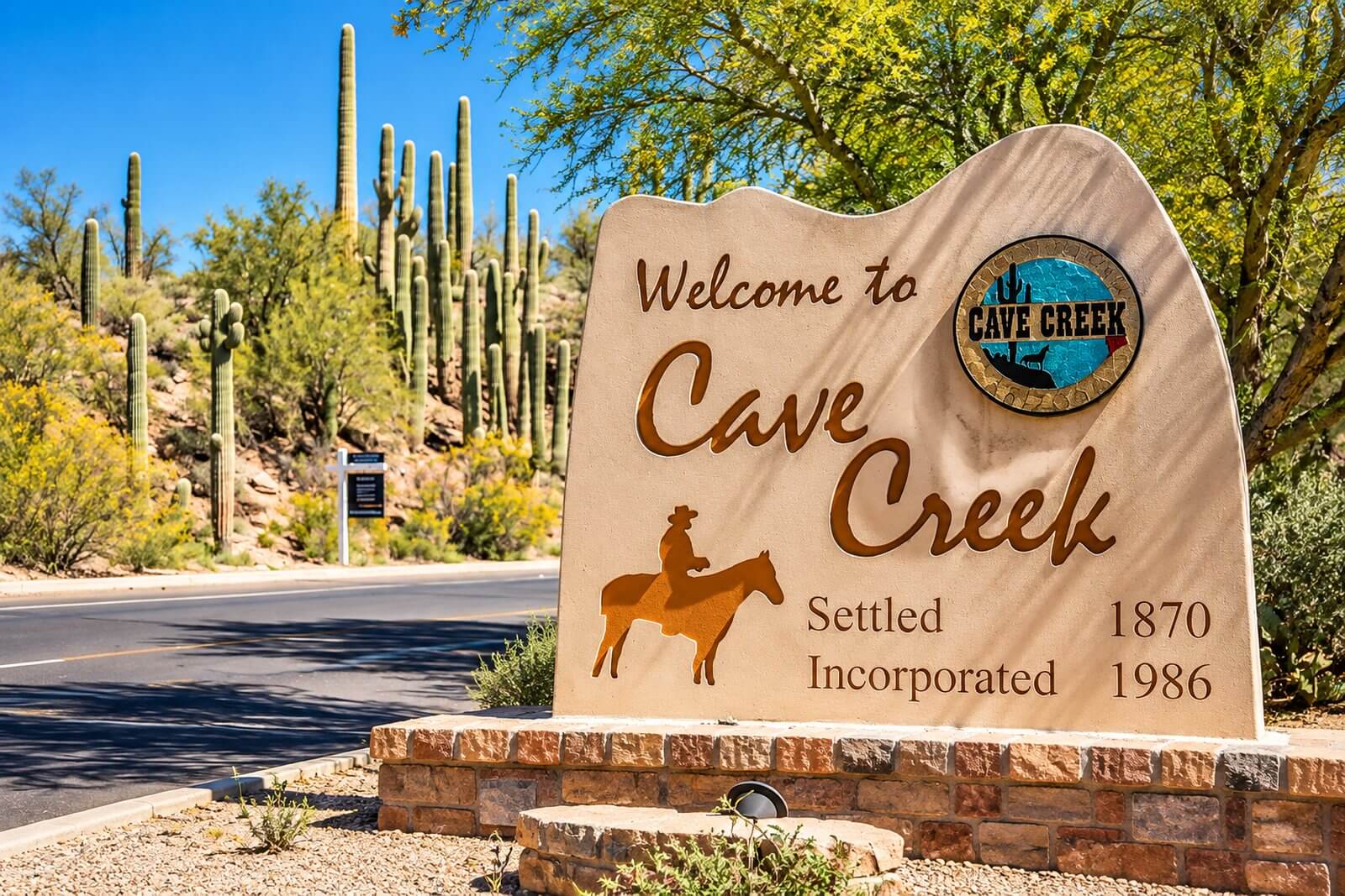 Cave Creek town sign with desert hills behind it, Arizona