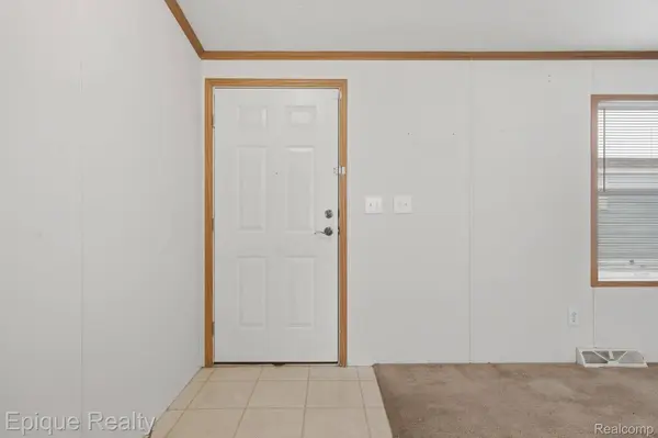 310 Greenwood, Wixom, MI 48393