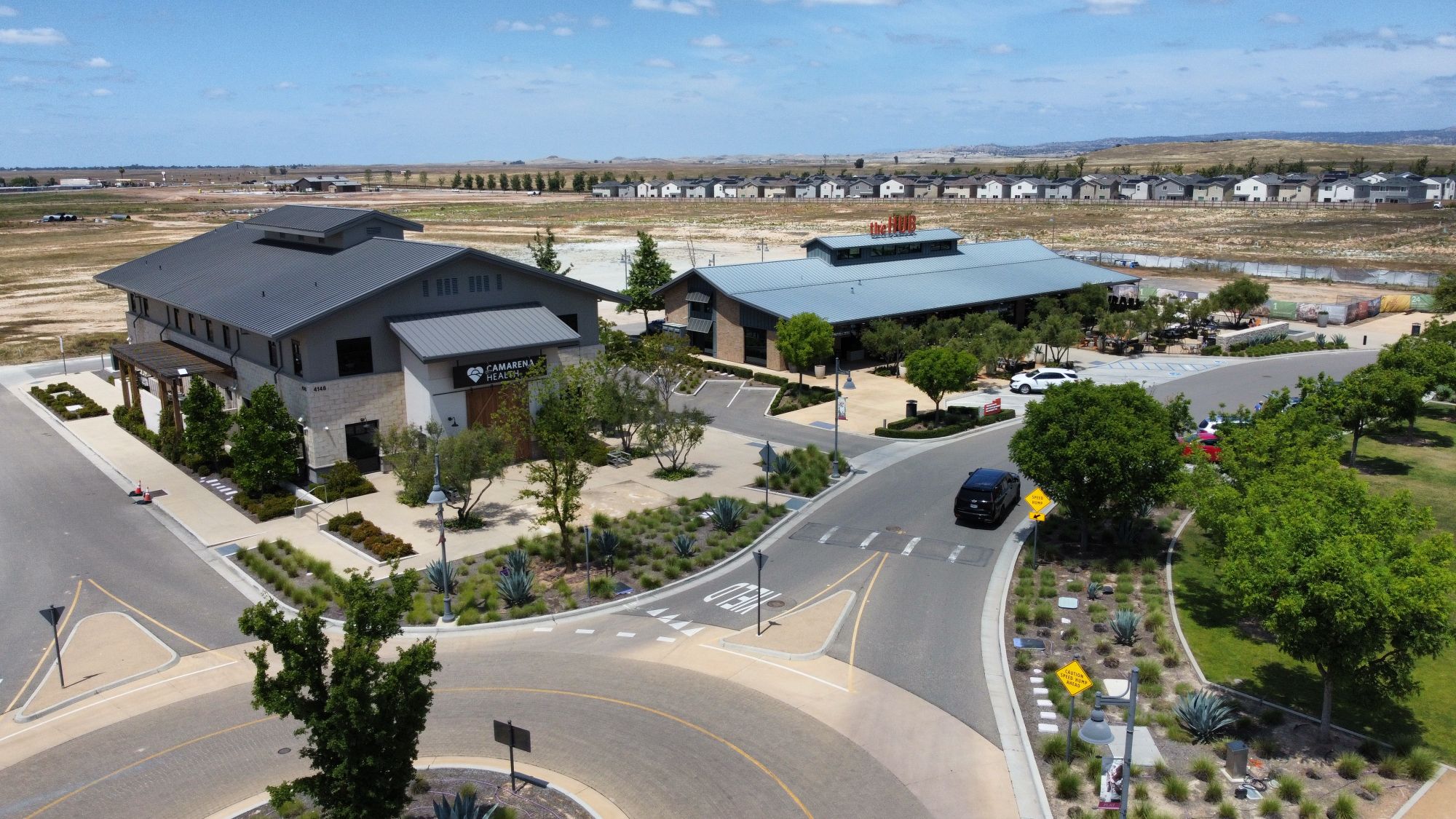 Aerial view of the Tesoro Viejo community core and clubhouse area in Madera County