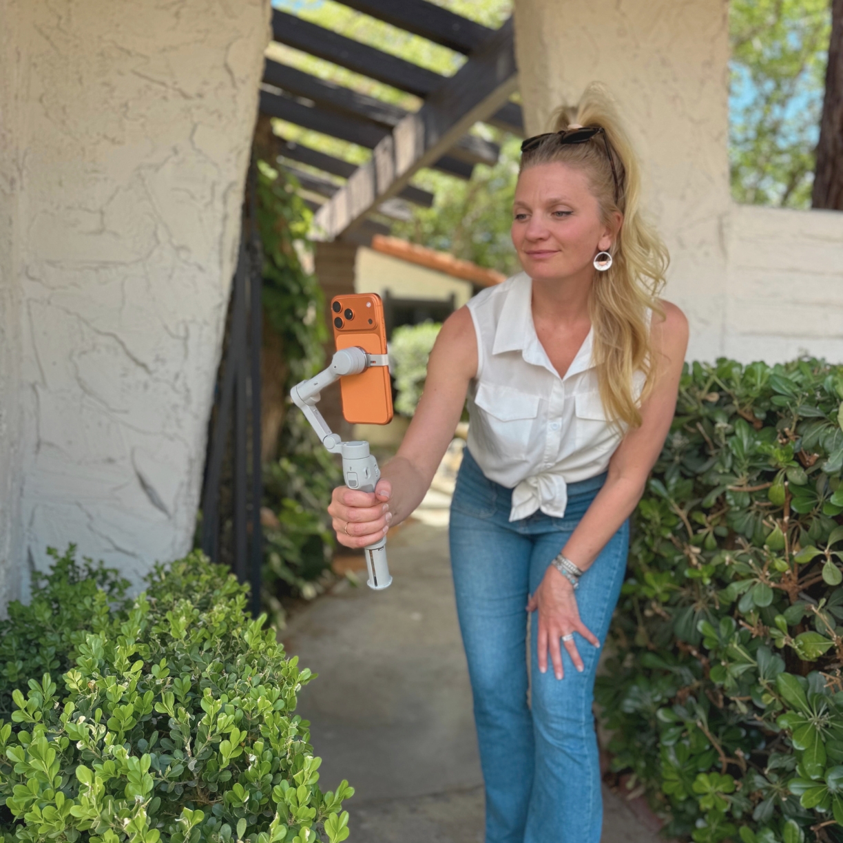 Las Vegas real estate agent Brittani Jones filming a vintage home