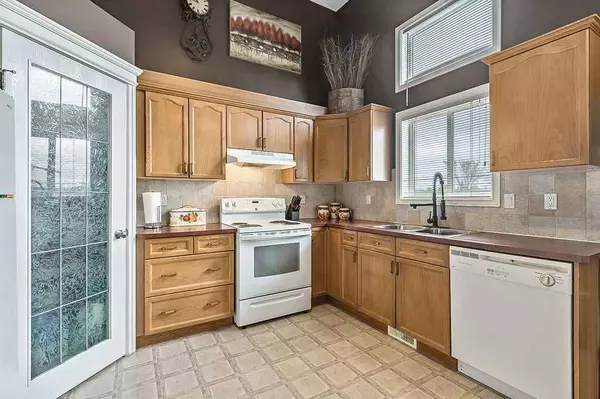 100 Crystal Shores CV, Okotoks, AB T1S 2B5