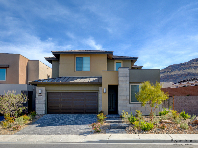 Summerlin Las Vegas modern home exterior Red Rock Canyon mountain backdrop Bryan Jones REALTOR