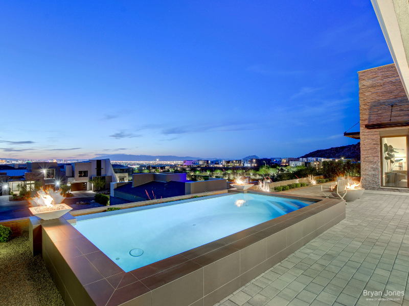 Las Vegas luxury home backyard pool twilight Nevada relocation tax savings Bryan Jones REALTOR