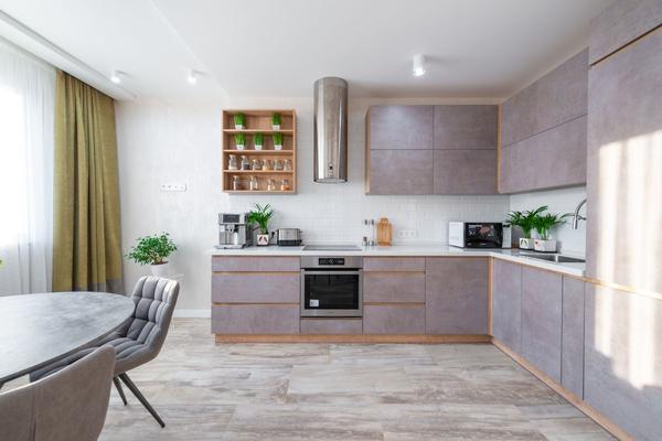 Bright modern kitchen with open shelving and natural light