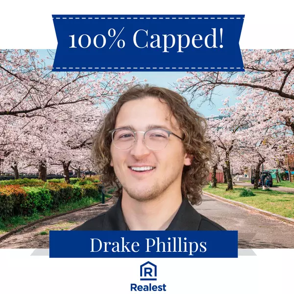 Celebrating Success: Drake Hits 100% Cap at Realest
