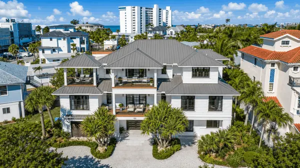 Beach Villas at the Oasis: Luxury Living Steps from the Gulf,Hunt Brothers Realty