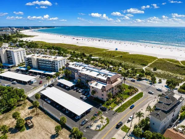 unset Royale: Beach Living Across from Siesta Key’s Famous Shoreline,Hunt Brothers Realty